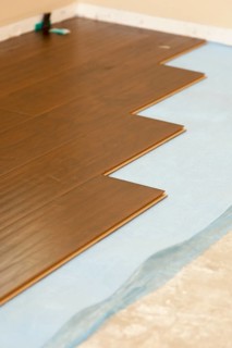 Newly installed brown laminate flooring abstract
