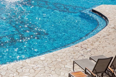 Exotic luxury swimming pool water and architecture abstract