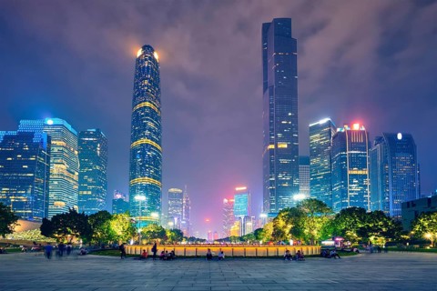 Guangzhou cityscape skyline Flower City Square illuminated in the evening
