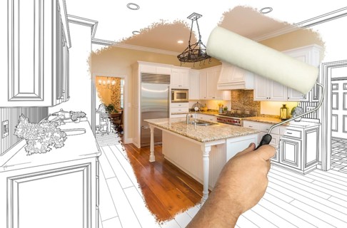 Before and after of man painting roller to reveal newly remodeled kitchen under pencil drawing plans