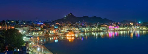 View of famous indian hinduism pilgrimage town sacred holy hindu religious city Pushkar with Brahma temple