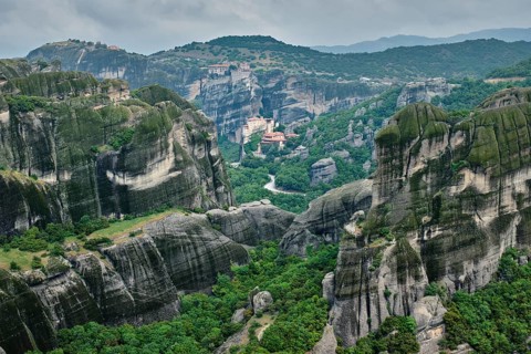 Monastery of Varlaam and Monastery of Rousanou and Monastery of Great Meteoron in famous greek tourist destination Meteora in Greece with scenic scenery landscape