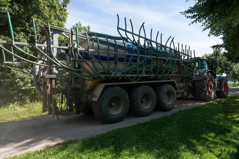 Large tractor with a slurry tanker