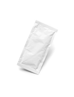 Blank white condiment packet floating isolated on white background