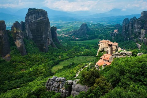 Sunset over monastery of Rousanou and Monastery of St