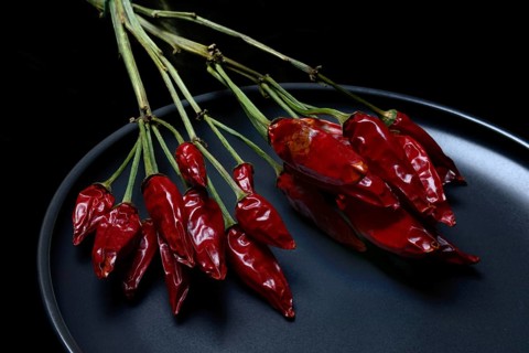 Dried chilli peppers on sweet pepper