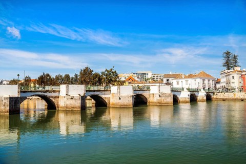 Beautiful cityscape of historic Tavira by Gilao river