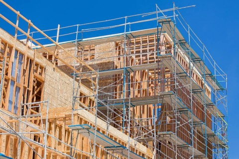 Scaffolding and wood framing at construction site