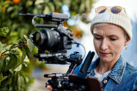 Camera operator with movie setup including a gimbal
