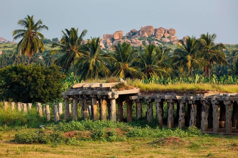 Ancient ruins of Hampi on sunset. Hampi