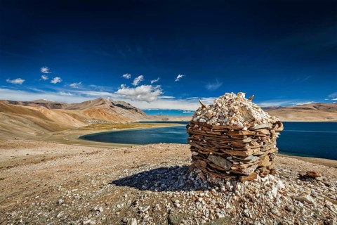 Stone cairn at Himalayan lake Tso Moriri