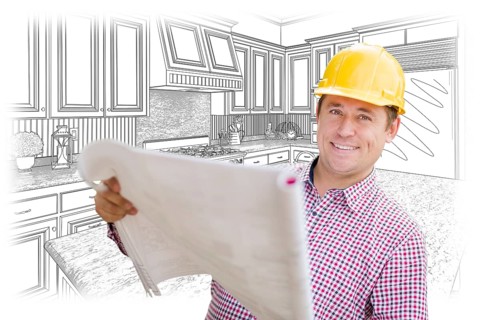 Smiling contractor holding blueprints over custom kitchen drawing