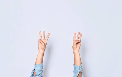 Hands counting three