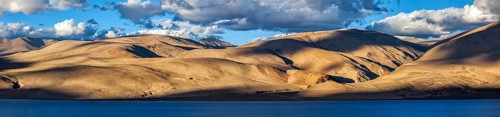 Panorama of Himalayan mountain lake Tso Moriri in Himalayas. Korzok