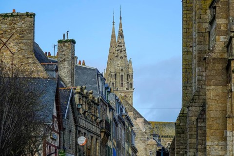 View from the chapel of Notre-Dame du Kreisker through the Rue General Leclerc to the Gothic cathedral of Saint-Paul Aurelien