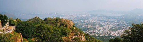 Aerial panorama of Udaipur with Lake Pichola and hills scenery