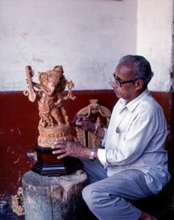 A craft man with his sandalwood Ganesha in Mysuru or Mysore