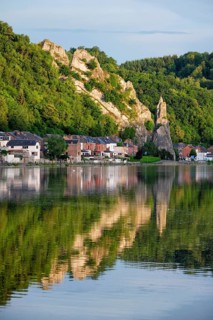 View of picturesque Dinant city over the Meuse river Dinant is a Walloon city and municipality located on the River Meuse