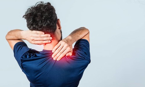 Close up of person with shoulder and neck problems