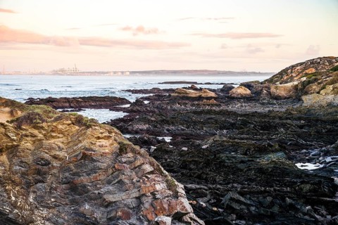 Beautiful landscape and seascape with rock formation in Samoqueira Beach