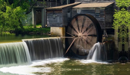 Pigeon forging mill in a small waterfall