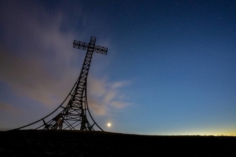 Monte Catria summit cross by night