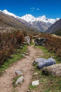 Old trade route in Himalaya surrounded with stones to Tibet from Chitkul village from Sangla Valley
