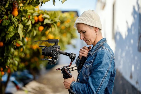 Camera operator with movie setup including a gimbal