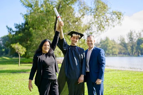 Young recently graduated boy