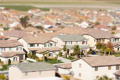 Aerial view of populated neigborhood of houses with tilt-shift blur