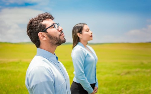 Concept of Young couple breathing fresh air with positive attitude