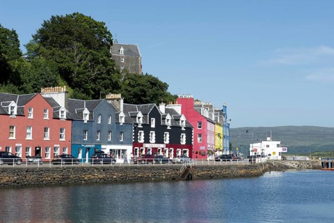 Colourful buildings on the waterfront in the harbour of the coastal town of Tobermory