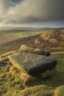 View from Gritstone rocks onto moorland habitat in the evening sun