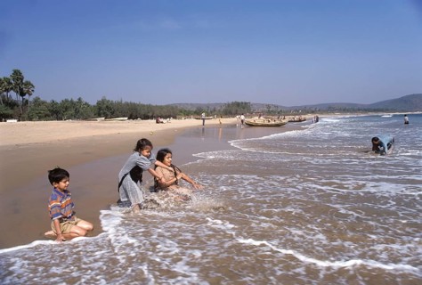 Children playing in Rishikonda beach in Visakhapatnam