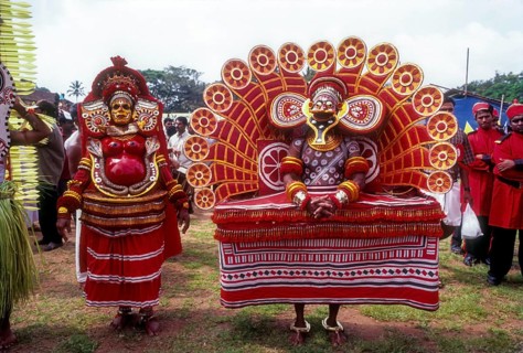 Theyyam dancers in Kavadiyattam in Athachamayam celebration in Thripunithura during Onam near Ernakulam