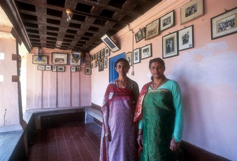 Kodava Women standing in her traditional home in Kodagu