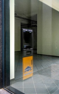 Euronet ATM on Kurfuerstendamm reflected in a shop window
