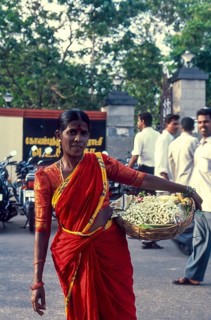 A Woman selling flowers near VOC Park at Coimbatore