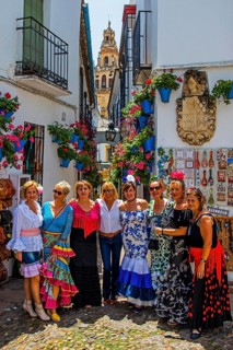 Women in flamenco costumes at the folk festival