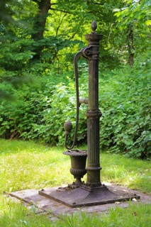 Old fountain with hand pump