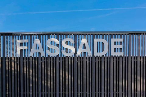 Lettering facade on wooden palisade