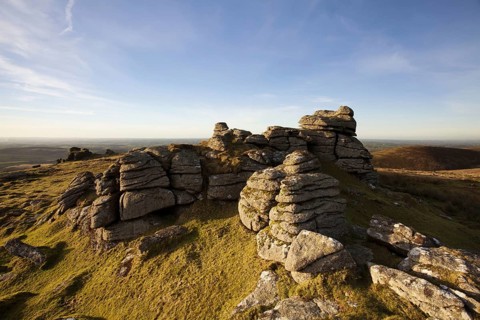 View of granite outcrop in bog habitat in the evening sun
