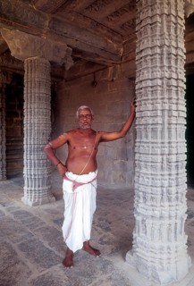 A Priest standing in Kampaheswarar Temple at Thirubuvanam
