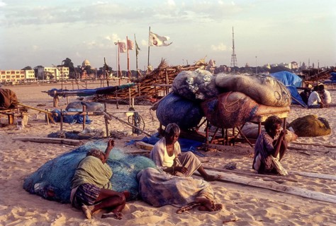 Fishermen resting the Marina beach in Chennai