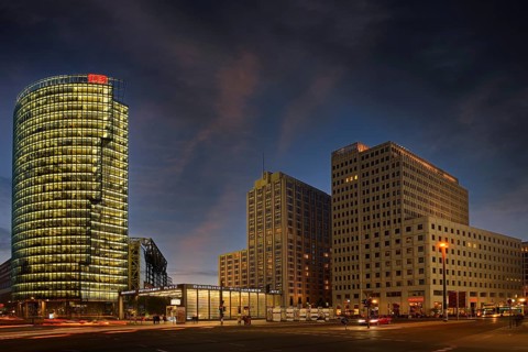 Bahntower on the left and Beisheim-Center with Ritz Carlton Hotel on the right in the evening at Potsdamer Platz