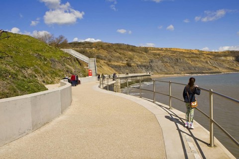 New seawall designed to slow coastal cliff erosion along vulnerable stretch of shore