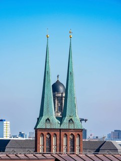 View from the roof terrace of the Stadtschloss to the towers of the Nikolaikirche and the old town house in Klosterstrasse