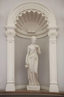 Elegant white figure in the foyer of the Kaiser-Wilhelms Bad in the spa garden
