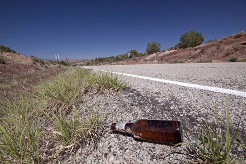 Glass bottle dumped at roadside