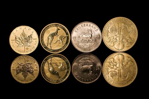 Four mirrored gold coins
